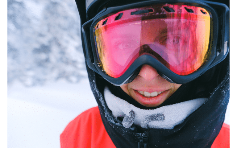 Man wearing ski goggles wintertime